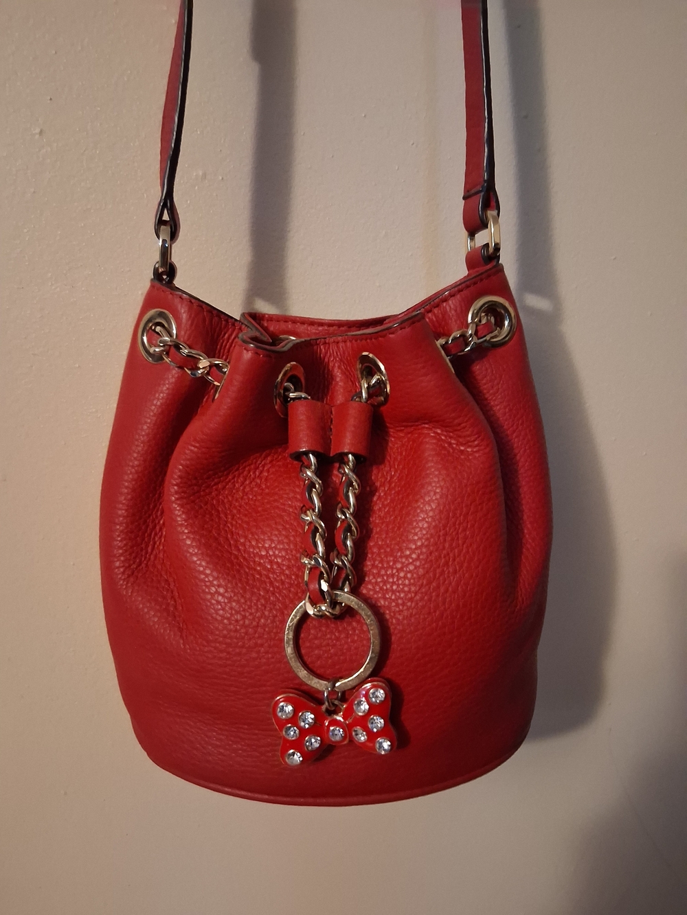 Michael Kors Red Pebbled Leather Mini Drawstring Bucket with Chain Bow Charm